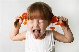 Little Girl Sticking Tongue Out